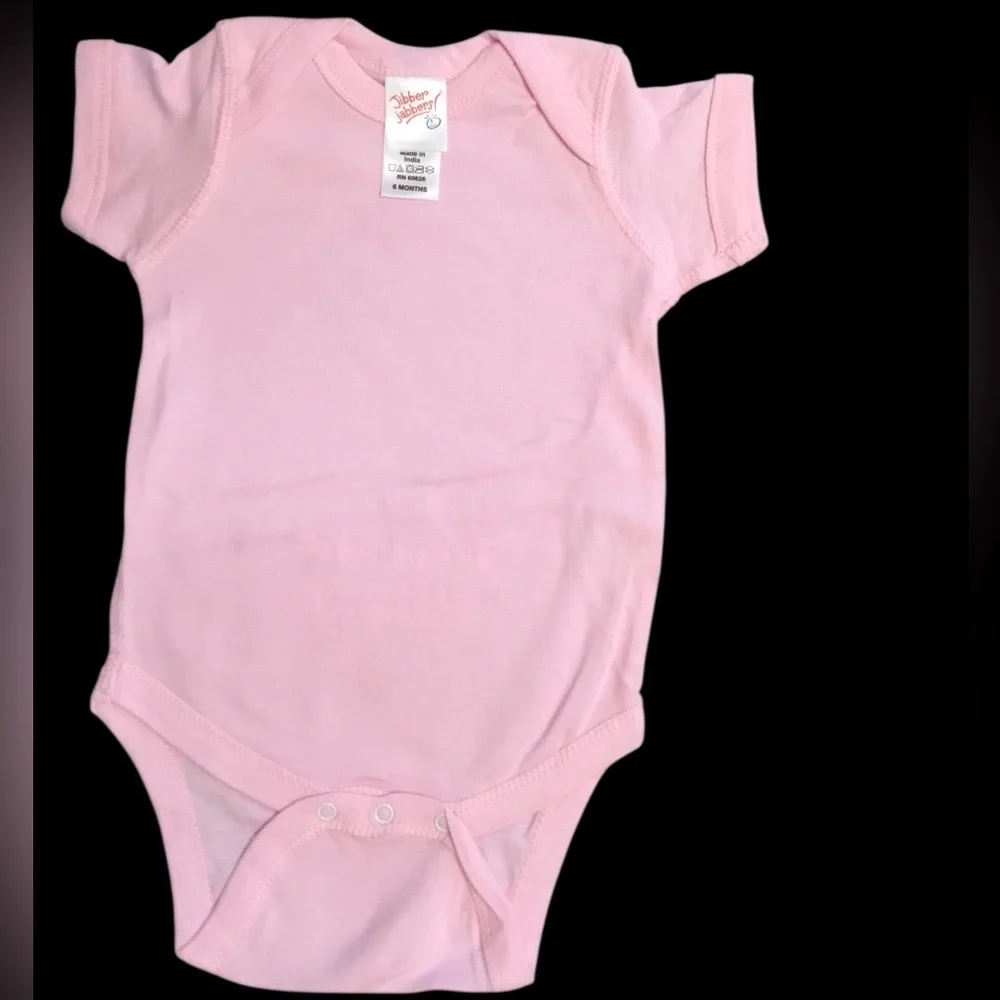 Pink Baby One-Piece Bodysuit w/White Print “I Love Grandma From The Bottom Up!”.